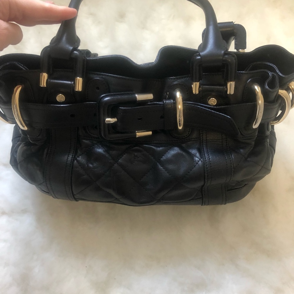 Burberry leather purse. Dust bag included
